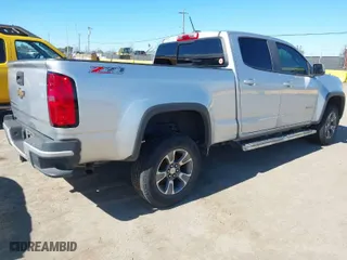 2019 Chevrolet Colorado 4WD Z71 with VIN 1GCGTDEN2K1146043, listed as a IAAI auction lot 41712002 with 84,034 mi miles. Bid and sale history available at carsss.com. Image 4.