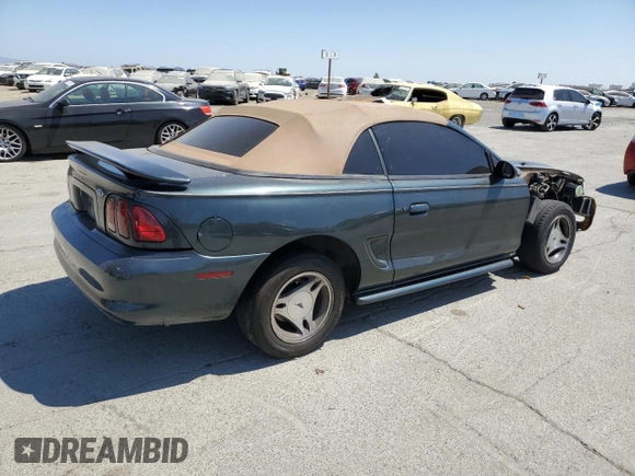 1998 Ford Mustang with VIN 1FAFP4447WF156297, listed as a Copart auction lot 60757265 with 61,296 mi miles and Salvage title. Bid and sale history available at DreamBid. Image 3.