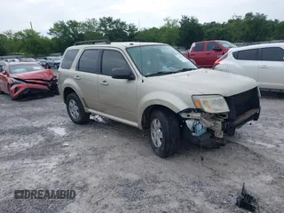 2011 Mercury Mariner z VIN 4M2CN8B72BKJ03915, wystawiony jako IAAI lot #42358251 z przebiegiem 169 206 mil mil oraz . Historia ofert i sprzedaży dostępna na DreamBid. Obrazek 1.
