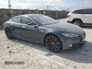 2014 Tesla Model S P85D with VIN 5YJSA1H28EFP62793, listed as a Copart auction lot 52902495 with Not Provided miles and Salvage Title. Bid and sale history available at DreamBid. Image 4.