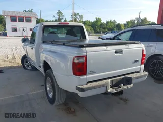 2003 Ford Ranger XL with VIN 1FTYR10U53PB75860, listed as a IAAI auction lot 41953686 with 129,082 mi miles. Bid and sale history available at carsss.com. Image 3.