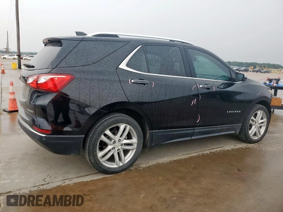 2021 Chevrolet Equinox Premier z VIN 2GNAXNEV9M6136701, wystawiony jako Copart lot #57288215 z przebiegiem 62 808 mil mil oraz Szkoda całkowita • Salvage title. Historia ofert i sprzedaży dostępna na DreamBid. Obrazek 3.