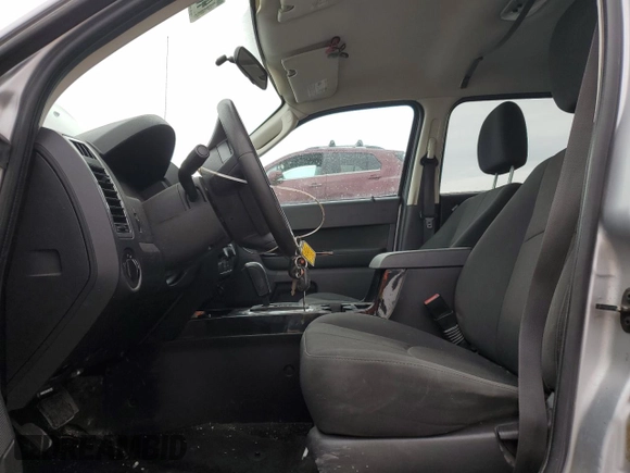 2011 Mazda Tribute Sport with VIN 4F2CY9C70BKM03826, listed as a Copart auction lot 45222665 with 171,082 mi miles and Salvage Title. Bid and sale history available at DreamBid. Image 7.