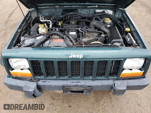 2000 Jeep Cherokee with VIN 1J4FF48S3YL149593, listed as a Copart auction lot 52489045 with 290,231 mi miles and Salvage title. Bid and sale history available at DreamBid. Image 11.