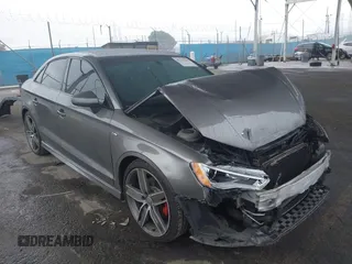 2016 Audi A3 Premium z VIN WAUA7GFF7G1050240, wystawiony jako IAAI lot #41777349 z przebiegiem 103 949 mil mil oraz . Historia ofert i sprzedaży dostępna na DreamBid. Obrazek 1.