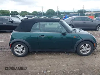 2005 MINI Convertible with VIN WMWRF33495TG11818, listed as a IAAI auction lot 42351446 with 100,033 mi miles and . Bid and sale history available at DreamBid. Image 13.