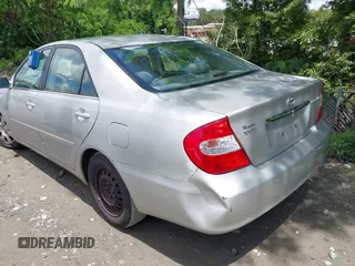 2003 Toyota Camry LE with VIN 4T1BE32K73U157902, listed as a IAAI auction lot 42248544 with 106,675 mi miles and . Bid and sale history available at DreamBid. Image 3.