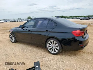2018 BMW 3 Series 320i with VIN WBA8A9C56JAH12021, listed as a Copart auction lot 58971175 with 100,317 mi miles and Salvage title. Bid and sale history available at DreamBid. Image 2.