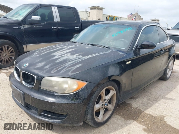 2009 BMW 1 Series 128i with VIN WBAUP73579VK75780, listed as a IAAI auction lot 42198035 with 136,100 mi miles and . Bid and sale history available at carsss.com. Image 2.