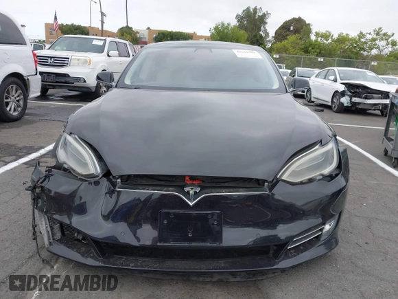 2017 Tesla Model S 100D with VIN 5YJSA1E26HF197176, listed as a IAAI auction lot 42565791 with 120,287 mi miles and . Bid and sale history available at DreamBid. Image 12.