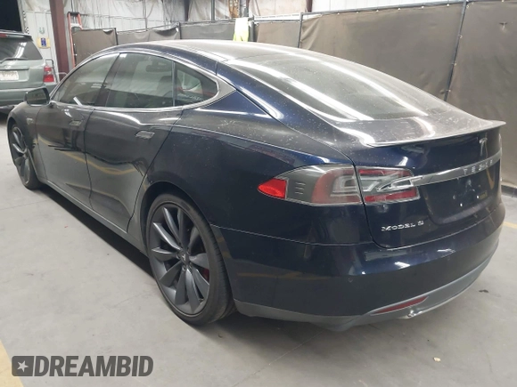 2014 Tesla Model S 60 with VIN 5YJSA1H11EFP56406, listed as a IAAI auction lot 42065157 with Not Provided miles and . Bid and sale history available at DreamBid. Image 3.