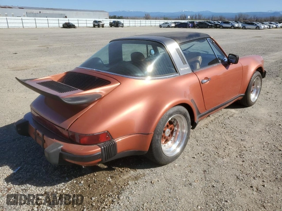 1974 Porsche 911 with VIN 9114111882, listed as a Copart auction lot 47080465 with 4,828 mi miles and Salvage title. Bid and sale history available at DreamBid. Image 3.