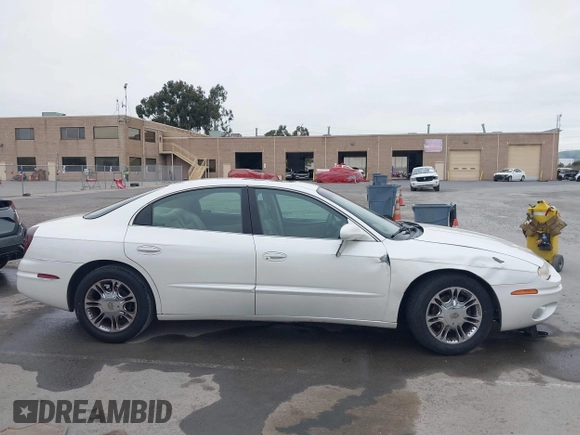 2001 Oldsmobile Aurora z VIN 1G3GS64C114109142, wystawiony jako IAAI lot #41974652 z przebiegiem 81 395 mil mil oraz . Historia ofert i sprzedaży dostępna na DreamBid. Obrazek 13.