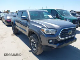 2018 Toyota Tacoma SR with VIN 5TFCZ5AN6JX127774, listed as a IAAI auction lot 41989635 with 28,161 mi miles. Bid and sale history available at carsss.com. Image 1.