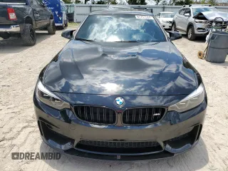 2018 BMW M4 with VIN WBS4Y9C51JAC86230, listed as a Copart auction lot 67757584 with 42,704 mi miles and Salvage Title. Bid and sale history available at carsss.com. Image 5.
