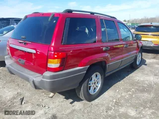 2004 Jeep Grand Cherokee Laredo with VIN 1J4GX48S64C401347, listed as a IAAI auction lot 41491111 with 189,436 mi miles. Bid and sale history available at carsss.com. Image 4.