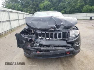 2016 Jeep Grand Cherokee Laredo with VIN 1C4RJEAG4GC394091, listed as a Copart auction lot 56595165 with 134,135 mi miles and Salvage title. Bid and sale history available at DreamBid. Image 5.