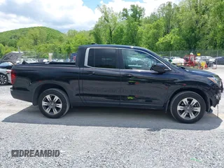 2017 Honda Ridgeline RTL with VIN 5FPYK3F51HB013989, listed as a IAAI auction lot 42206513 with 146,124 mi miles and . Bid and sale history available at DreamBid. Image 13.