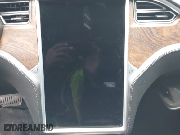 2017 Tesla Model S 100D with VIN 5YJSA1E25HF215778, listed as a IAAI auction lot 41692605 with Not Provided miles and . Bid and sale history available at DreamBid. Image 7.