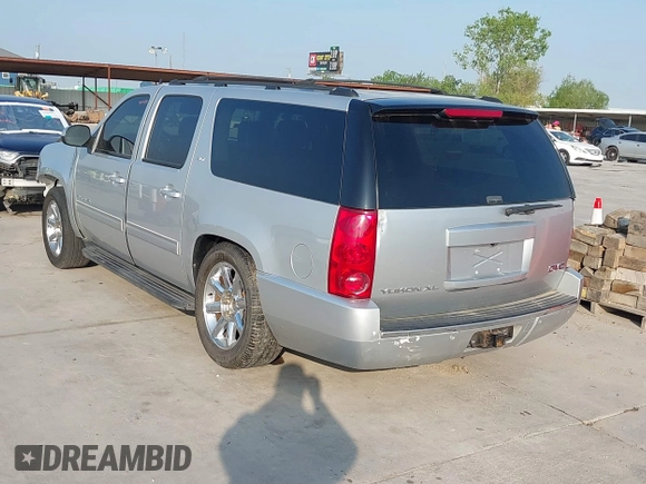 2014 GMC Yukon XL SLT with VIN 1GKS1KE09ER230704, listed as a IAAI auction lot 42046847 with 85,381 mi miles. Bid and sale history available at carsss.com. Image 3.
