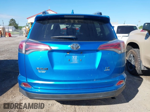 2016 Toyota RAV4 LE with VIN JTMBFREV2GD183811, listed as a IAAI auction lot 42216793 with 95,270 mi miles and . Bid and sale history available at DreamBid. Image 16.