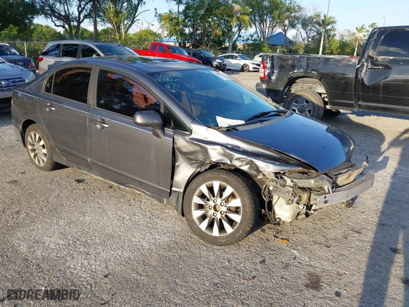 2010 Honda Civic Sdn EX with VIN 19XFA1F80AE026715, listed as a IAAI auction lot 41887154 with 128,272 mi miles. Bid and sale history available at carsss.com. Image 1.