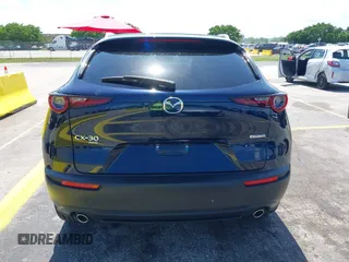 2024 Mazda CX-30 S Select Sport z VIN 3MVDMBBM0RM697731, wystawiony jako IAAI lot #42329490 z przebiegiem 17 675 mil mil oraz . Historia ofert i sprzedaży dostępna na DreamBid. Obrazek 16.