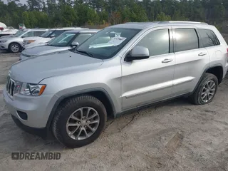2012 Jeep Grand Cherokee Laredo with VIN 1C4RJFAG7CC189381, listed as a IAAI auction lot 41429085 with 137,238 mi miles. Bid and sale history available at carsss.com. Image 2.
