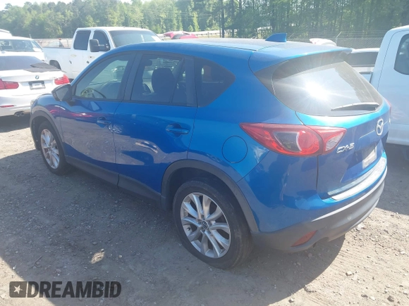 2013 Mazda CX-5 Grand Touring with VIN JM3KE2DEXD0123314, listed as a IAAI auction lot 42064266 with 288,935 mi miles. Bid and sale history available at carsss.com. Image 3.