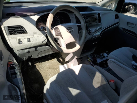 2014 Toyota Sienna LE AAS with VIN 5TDKK3DC6ES511466, listed as a Copart auction lot 52517555 with 142,744 mi miles and Salvage Title. Bid and sale history available at DreamBid. Image 8.
