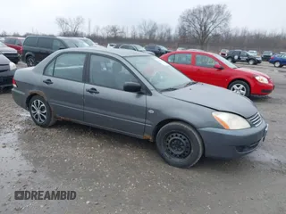 2006 Mitsubishi Lancer ES with VIN JA3AJ26E76U066867, listed as a IAAI auction lot 41904428 with 247,460 mi miles. Bid and sale history available at carsss.com. Image 1.