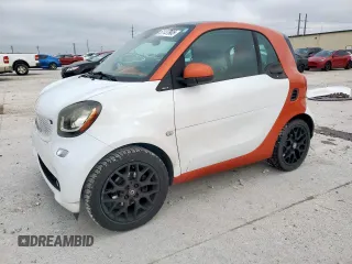 2016 Smart fortwo Passion with VIN WMEFJ5DA4GK068230, listed as a Copart auction lot 51137905 with 52,492 mi miles and Salvage Title. Bid and sale history available at DreamBid. Image 1.