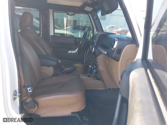 2016 Jeep Wrangler Unlimited 75th Anniversary with VIN 1C4BJWEG3GL194420, listed as a IAAI auction lot 41678849 with 127,194 mi miles. Bid and sale history available at carsss.com. Image 5.