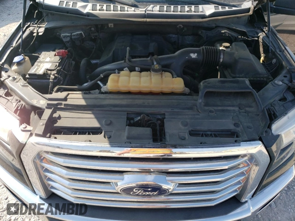 2015 Ford F-150 XLT with VIN 1FTEW1EP0FKF00544, listed as a Copart auction lot 62571615 with 233,318 mi miles and Salvage title. Bid and sale history available at DreamBid. Image 11.