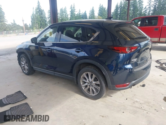 2019 Mazda CX-5 Grand Touring with VIN JM3KFBDM6K0522903, listed as a IAAI auction lot 42583005 with 61,174 mi miles and . Bid and sale history available at DreamBid. Image 3.