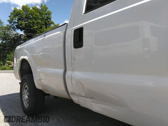 2014 Ford F-250 XL z VIN 1FTBF2B64EEB63961, wystawiony jako IAAI lot #42357797 z przebiegiem 211 419 mil mil oraz . Historia ofert i sprzedaży dostępna na DreamBid. Obrazek 6.