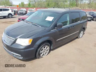2012 Chrysler Town & Country Touring with VIN 2C4RC1BG8CR326041, listed as a IAAI auction lot 42137341 with 112,026 mi miles. Bid and sale history available at carsss.com. Image 2.