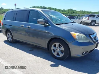 2010 Honda Odyssey Touring с VIN 5FNRL3H90AB074881, выставлен на аукционе IAAI как лот 42325159 с пробегом 234 401 миль миль и . История ставок и продаж доступна на DreamBid. Изображение 1.