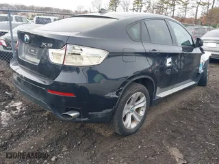 2011 BMW X6 35i with VIN 5UXFG2C58BLX08487, listed as a IAAI auction lot 41627394 with 999,999 mi miles. Bid and sale history available at carsss.com. Image 4.