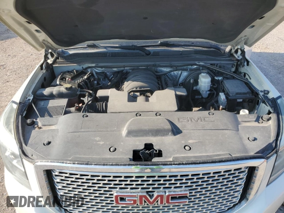 2015 GMC Yukon Denali with VIN 1GKS1CKJ0FR530006, listed as a Copart auction lot 66010184 with 140,292 mi miles and Clean Title. Bid and sale history available at carsss.com. Image 12.