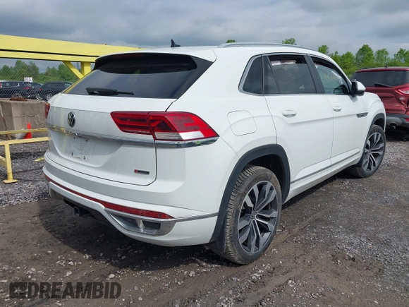 2021 Volkswagen Atlas SEL z VIN 1V2SE2CA7MC214805, wystawiony jako IAAI lot #42374591 z przebiegiem 61 775 mil mil oraz . Historia ofert i sprzedaży dostępna na DreamBid. Obrazek 4.
