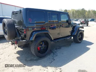 2014 Jeep Wrangler Unlimited Sahara with VIN 1C4BJWEG1EL258242, listed as a IAAI auction lot 41894966 with 90,234 mi miles. Bid and sale history available at carsss.com. Image 4.