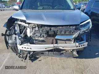 2020 Honda Pilot EX-L z VIN 5FNYF5H51LB016163, wystawiony jako IAAI lot #42030430 z przebiegiem 65 383 mil mil oraz . Historia ofert i sprzedaży dostępna na DreamBid. Obrazek 6.