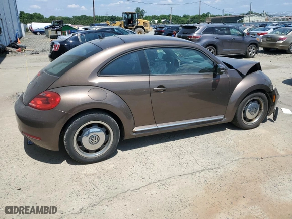 2012 Volkswagen Beetle 2.5L w/Sun PZEV with VIN 3VWJP7AT6CM606385, listed as a Copart auction lot 59566374 with 123,568 mi miles and Salvage Title. Bid and sale history available at carsss.com. Image 3.