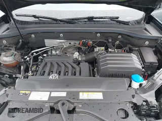 2022 Volkswagen Atlas SE z VIN 1V2WE2CA3NC203707, wystawiony jako IAAI lot #41720912 z przebiegiem 50 572 mil mil oraz . Historia ofert i sprzedaży dostępna na DreamBid. Obrazek 10.