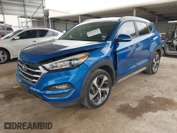 2018 Hyundai Tucson Sport with VIN KM8J33AL0JU803368, listed as a IAAI auction lot 41937235 with 64,163 mi miles and . Bid and sale history available at DreamBid. Image 18.
