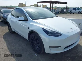 2022 Tesla Model Y Performance z VIN 7SAYGDEF9NF358308, wystawiony jako IAAI lot #41846137 z przebiegiem 57 535 mil mil oraz . Historia ofert i sprzedaży dostępna na DreamBid. Obrazek 1.