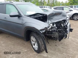 2018 Volkswagen Atlas SE z VIN 1V2KR2CAXJC517240, wystawiony jako IAAI lot #42361370 z przebiegiem 129 546 mil mil oraz . Historia ofert i sprzedaży dostępna na DreamBid. Obrazek 18.