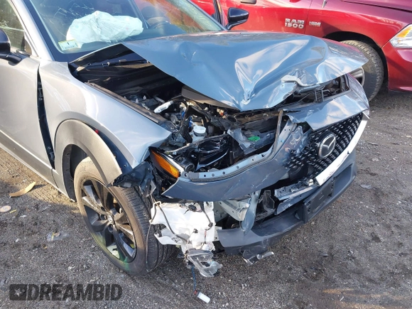 2023 Mazda CX-30 S Carbon Edition with VIN 3MVDMBCM0PM510726, listed as a IAAI auction lot 41150274 with 18,394 mi miles and . Bid and sale history available at DreamBid. Image 6.