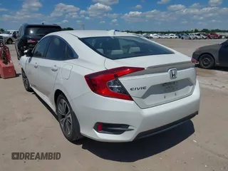 2018 Honda Civic EX-T z VIN JHMFC1F3XJX001723, wystawiony jako IAAI lot #42228776 z przebiegiem 97 432 mil mil oraz . Historia ofert i sprzedaży dostępna na DreamBid. Obrazek 3.